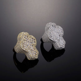 Gold and Silver iced cross statement rings on black