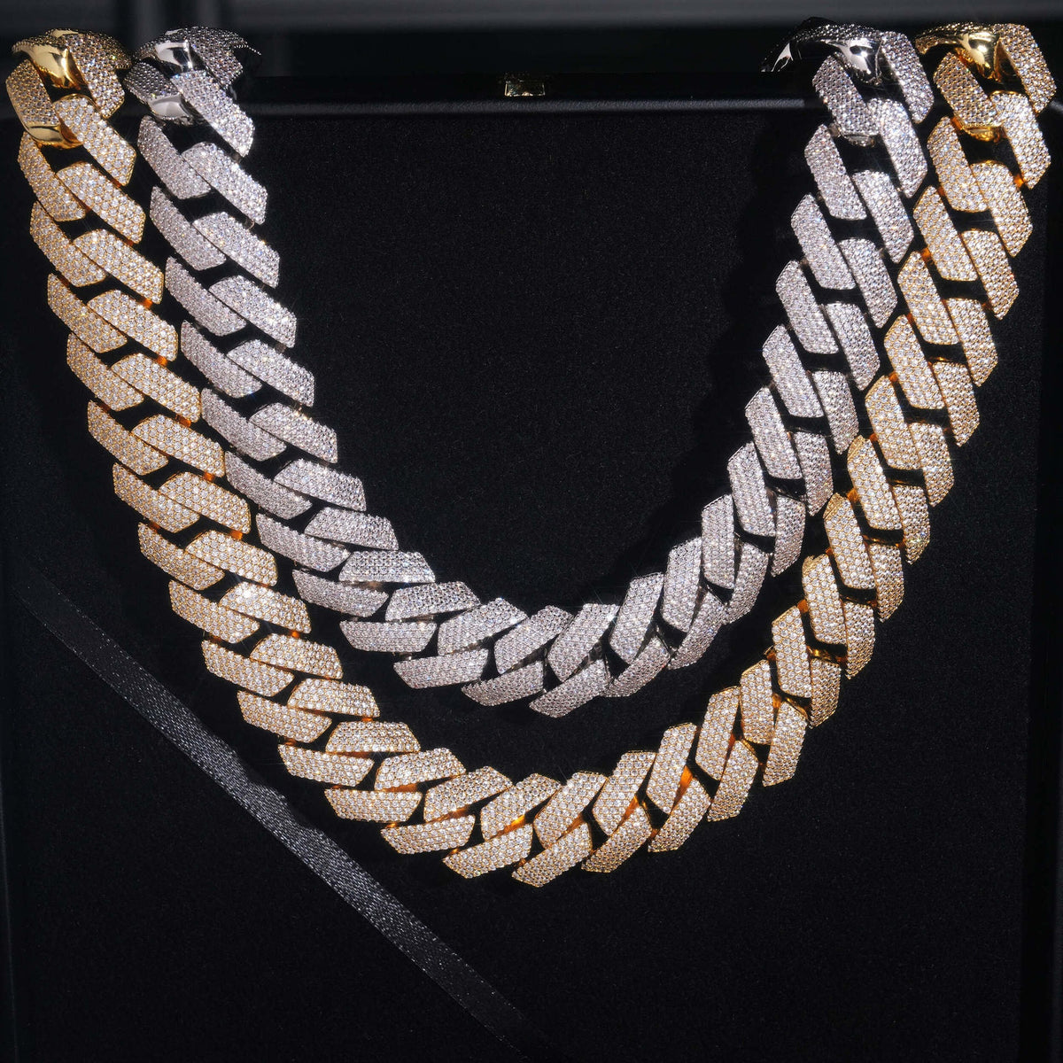 Silver and gold 4-row iced Cuban chains shown together