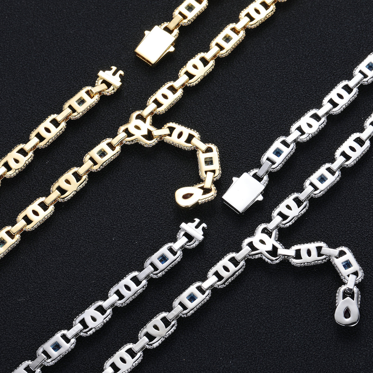 Backs of silver- and gold-tone geometric links and their open clasps