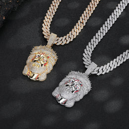Gold- and silver-tone iced Jesus pendant comparison