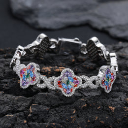 Silver-tone multicolor zircon clover bracelet on black rock