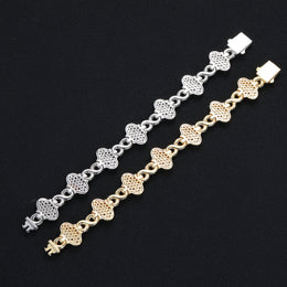 Silver-tone and gold-tone clover bracelet finish comparison