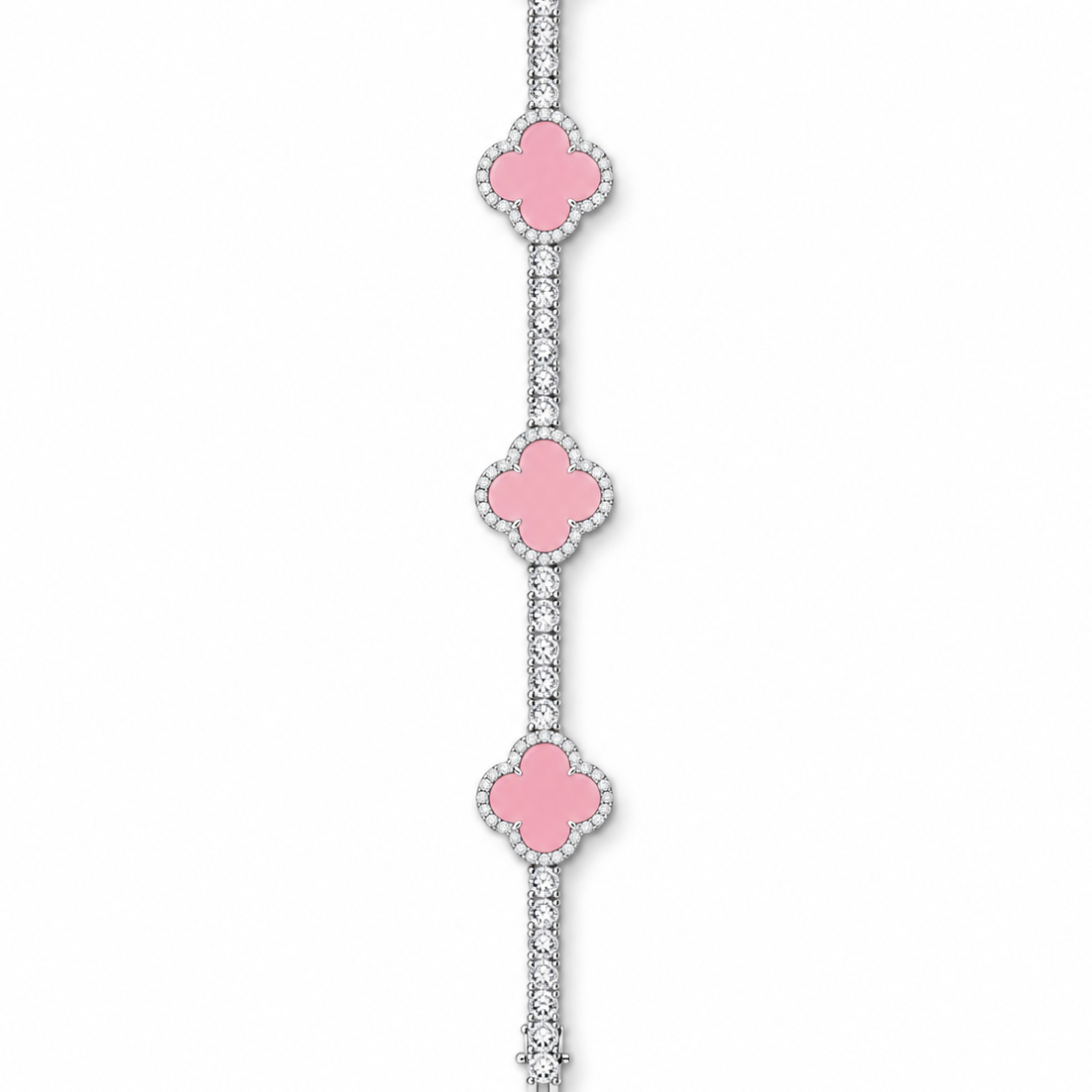 Silver-tone tennis bracelet with pink clover inlays displayed open on white