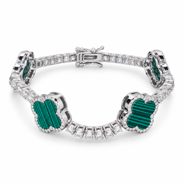 Silver-tone tennis bracelet with striped green clover inlays on white