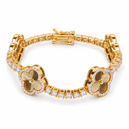 Gold-tone engraved clover tennis bracelet with clear stone halos on white