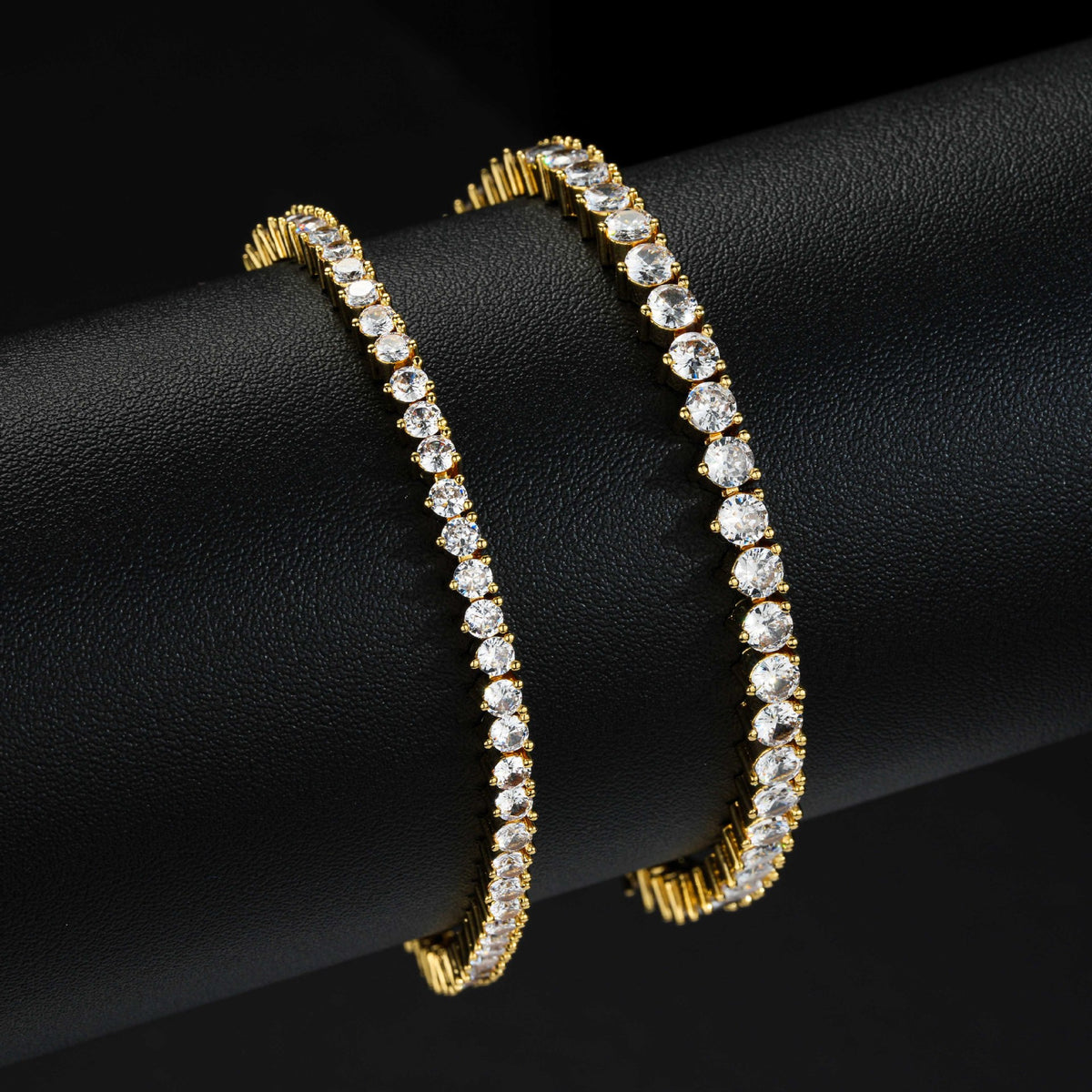 Gold-tone tennis bracelets comparing two stone widths