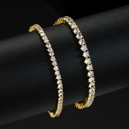 Gold-tone tennis bracelets comparing two stone widths