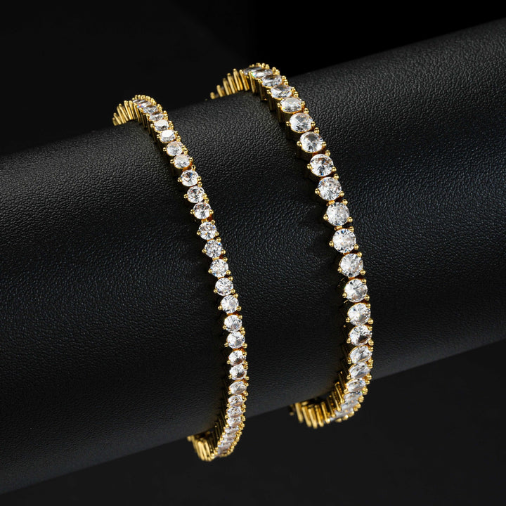 Gold-tone tennis bracelets comparing two stone widths