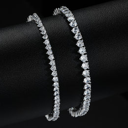 Silver-tone tennis bracelets comparing two stone widths