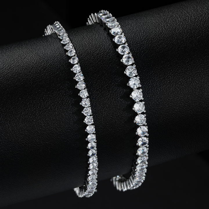 Silver-tone tennis bracelets comparing two stone widths