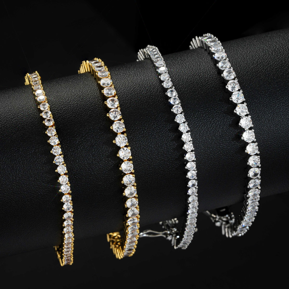 Tennis bracelets in Silver and Gold comparing two widths