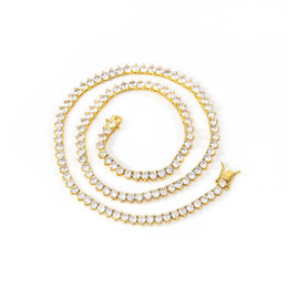 Gold-tone three-prong tennis necklace arranged in a spiral