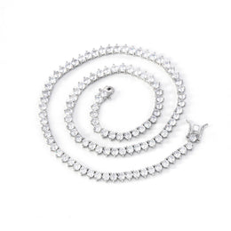 Silver-tone three-prong tennis necklace arranged in a spiral