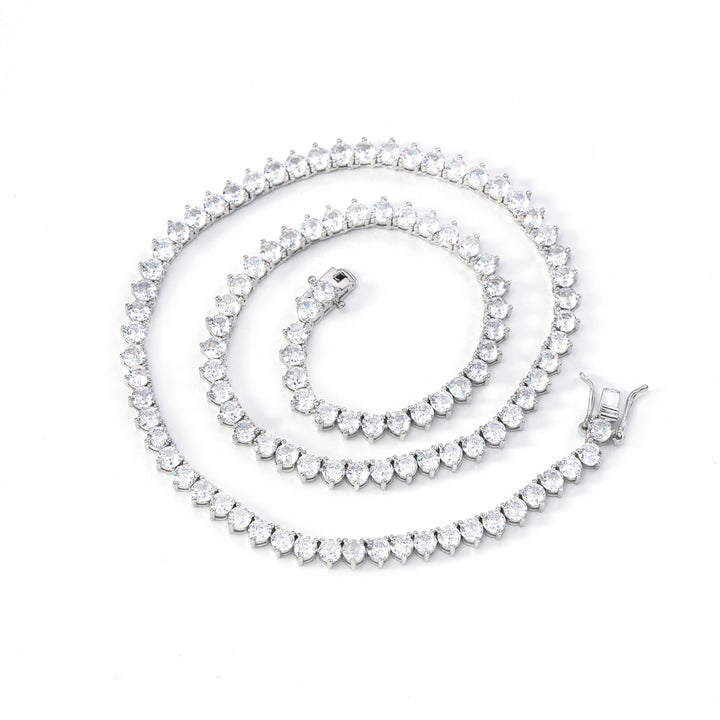 Silver-tone three-prong tennis necklace arranged in a spiral