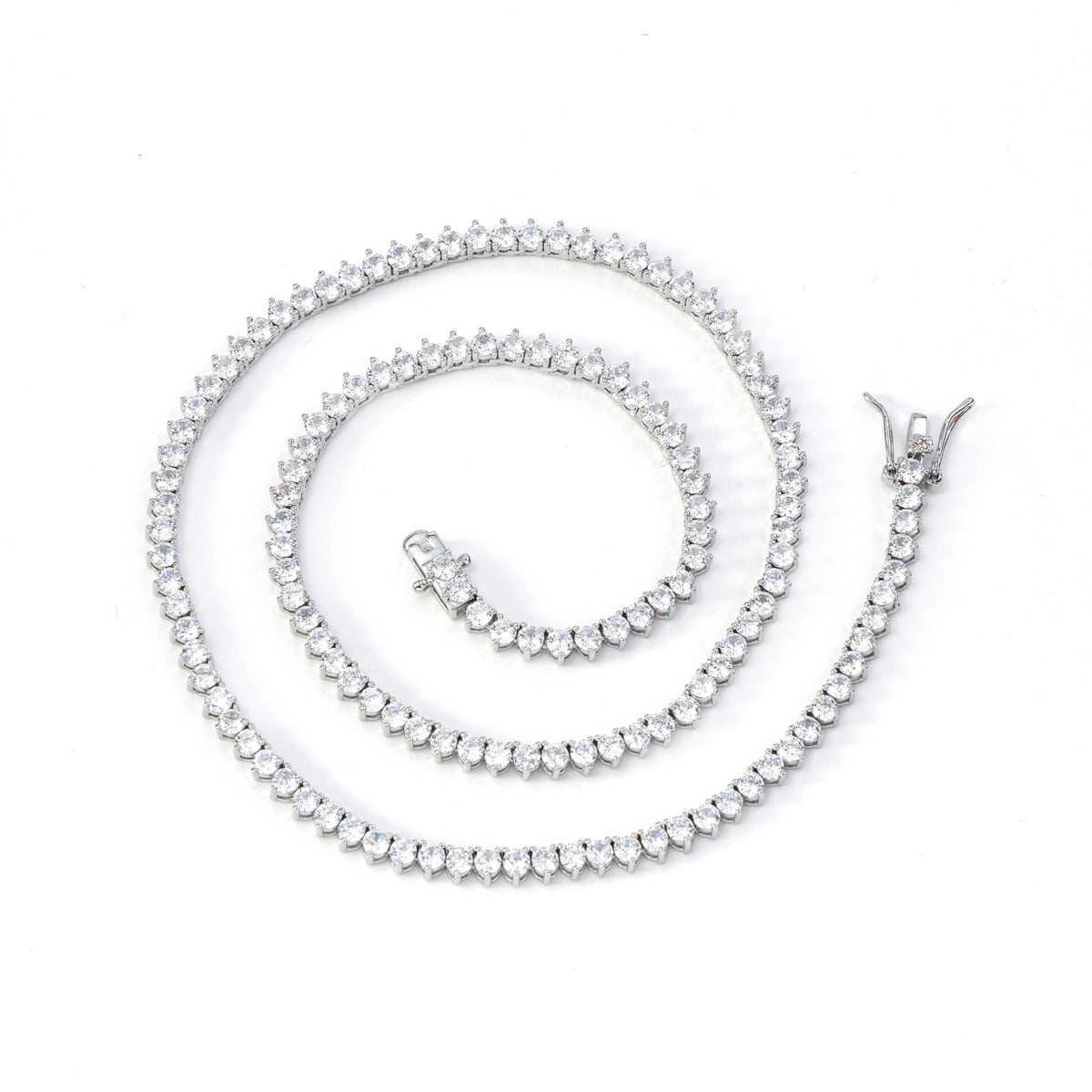 Silver-tone three-prong tennis necklace arranged in a spiral