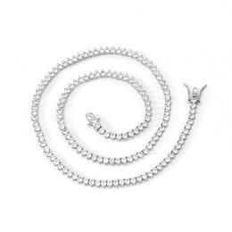 Silver-tone three-prong tennis necklace arranged in a spiral