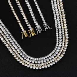 Tennis necklaces in Silver and Gold with round stones and open clasps