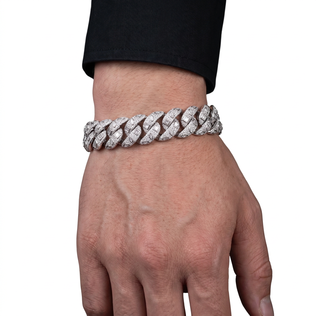 Adult model wearing a silver-tone braided Cuban link bracelet with square and marquise accents
