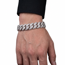 Adult model wearing a silver-tone braided Cuban link bracelet with square and marquise accents