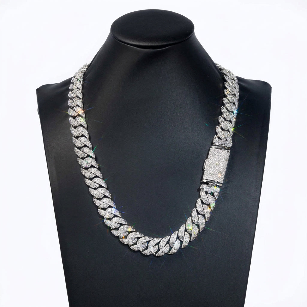 Silver-tone Cuban necklace displayed on a black bust