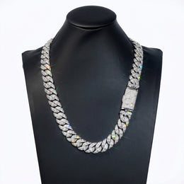 Silver-tone Cuban necklace displayed on a black bust