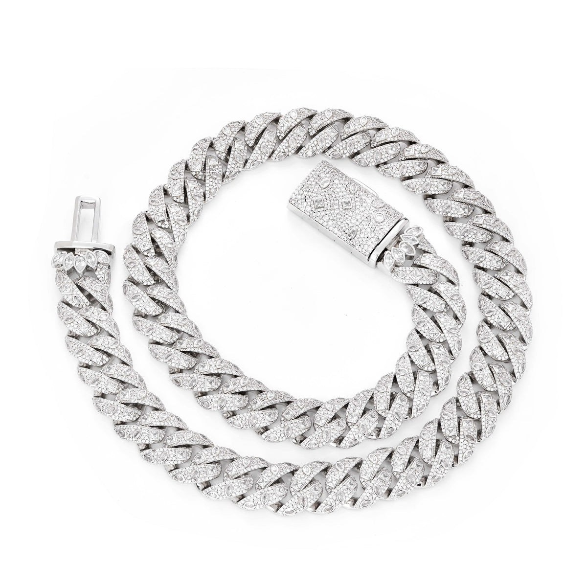 Silver-tone Cuban necklace coiled on white with its box clasp open