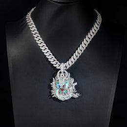 Silver iced dragon pendant on a black display bust