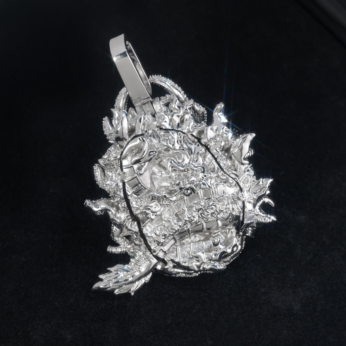 Silver iced dragon pendant back view