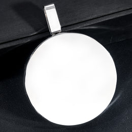 Polished silver-tone back and bail of the lion medallion pendant