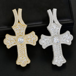 Gold and silver oversized iced cross pendants front view