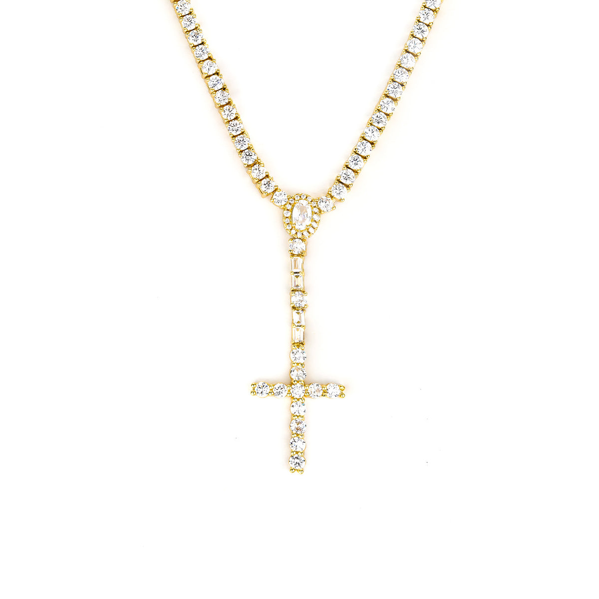 Gold-tone cross drop tennis necklace with an oval halo and rectangular stone accents on white