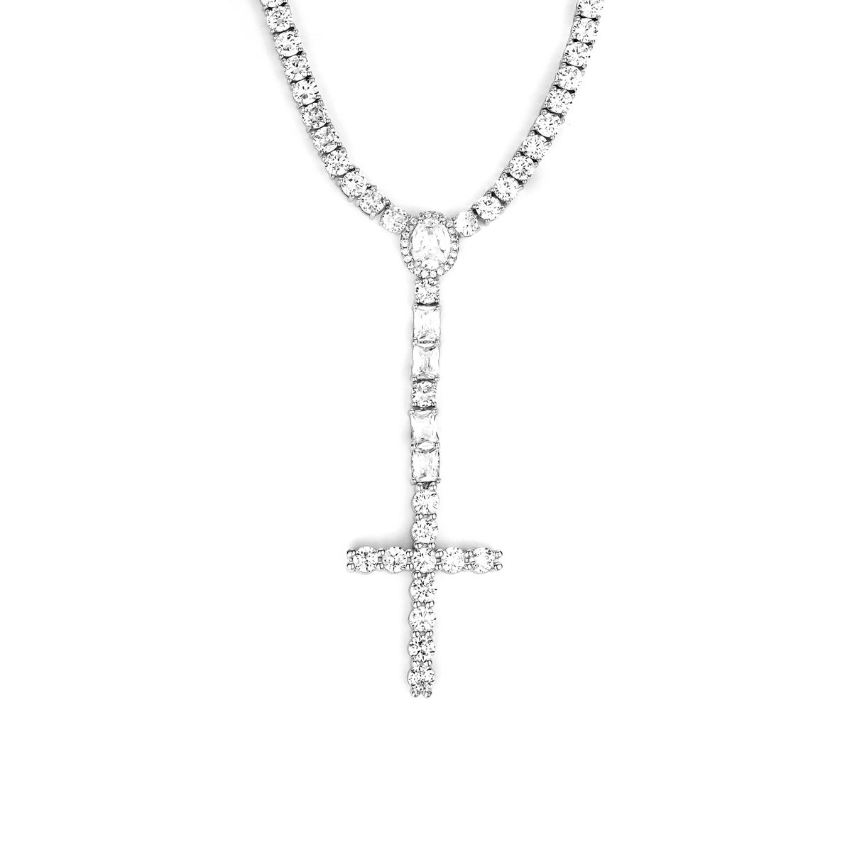 Silver-tone cross drop tennis necklace with an oval halo and rectangular stone accents on white