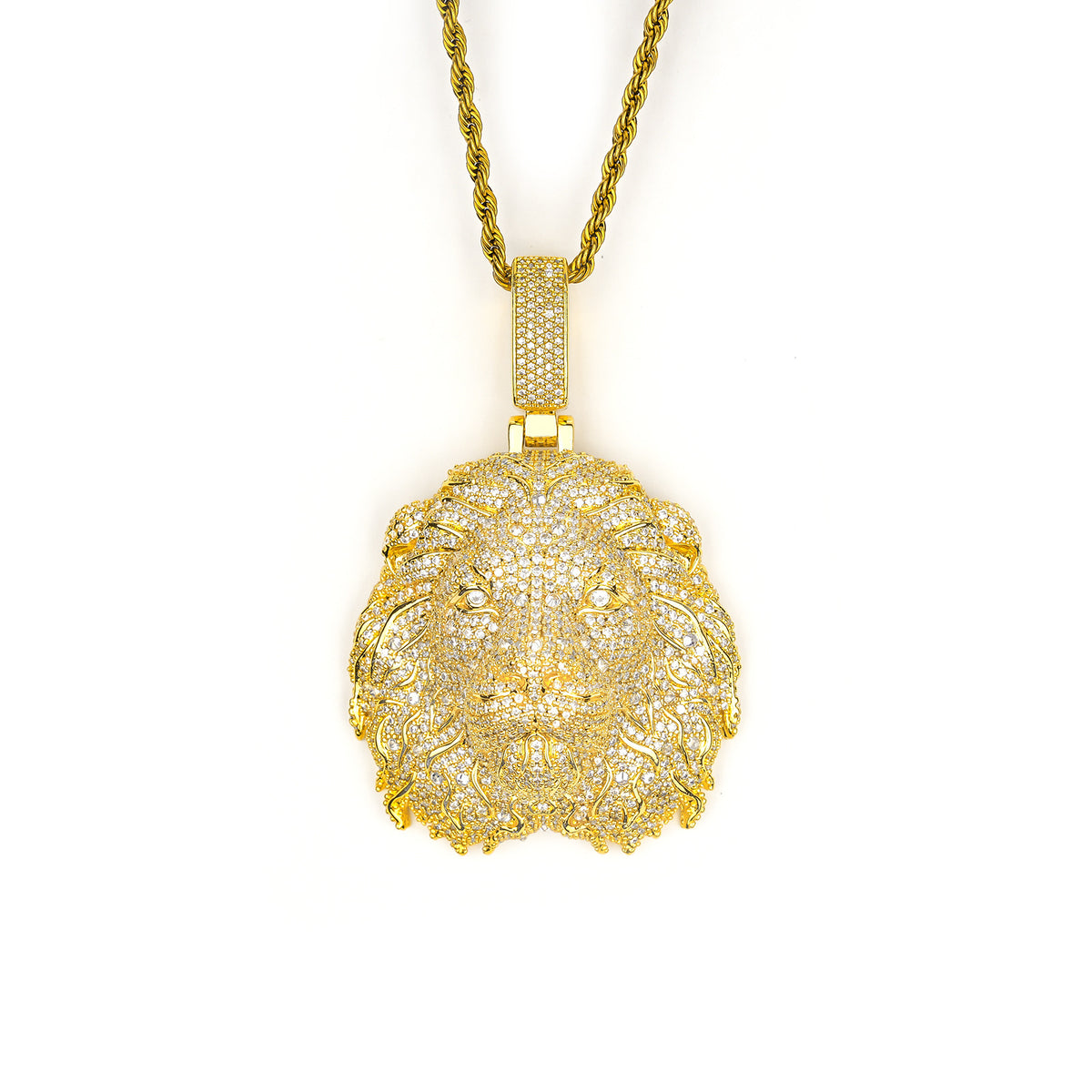Gold-tone lion head pendant with stone-set mane on white