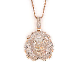 Rose-gold-tone lion head pendant with stone-set mane on white