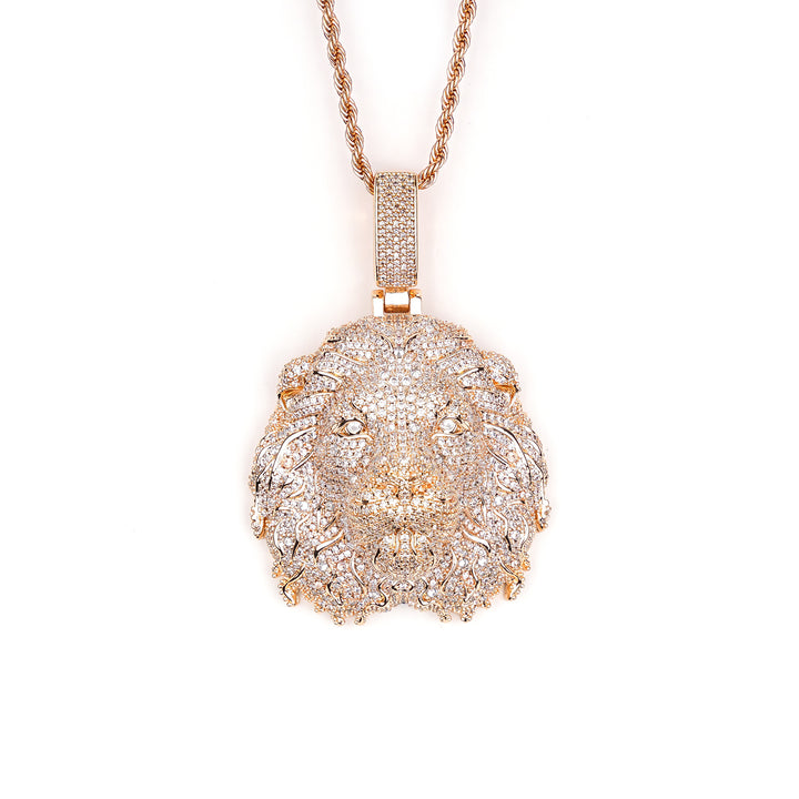 Rose-gold-tone lion head pendant with stone-set mane on white