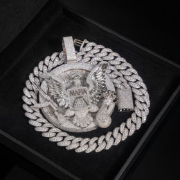 Silver-tone eagle medallion pendant on a black display