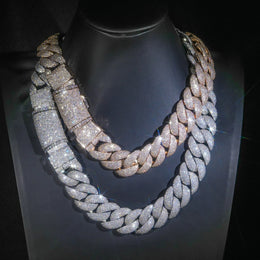 Silver and gold-tone iced bubble Cuban chains on display stands
