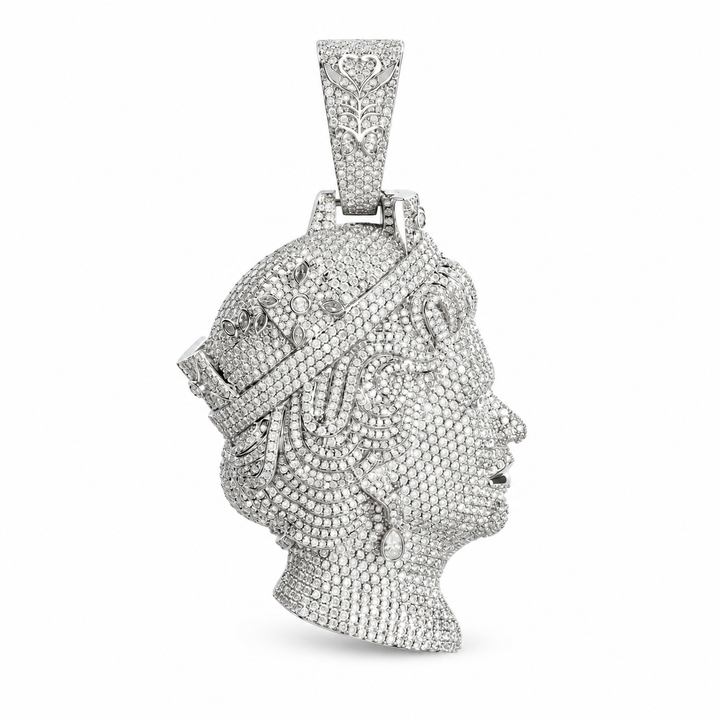 Silver-tone iced queen portrait pendant with an ornate elongated bail on white