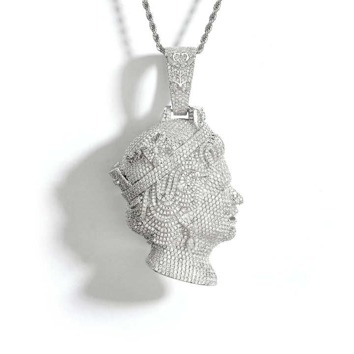 Silver-tone queen portrait pendant with a pavé face and tiara on white