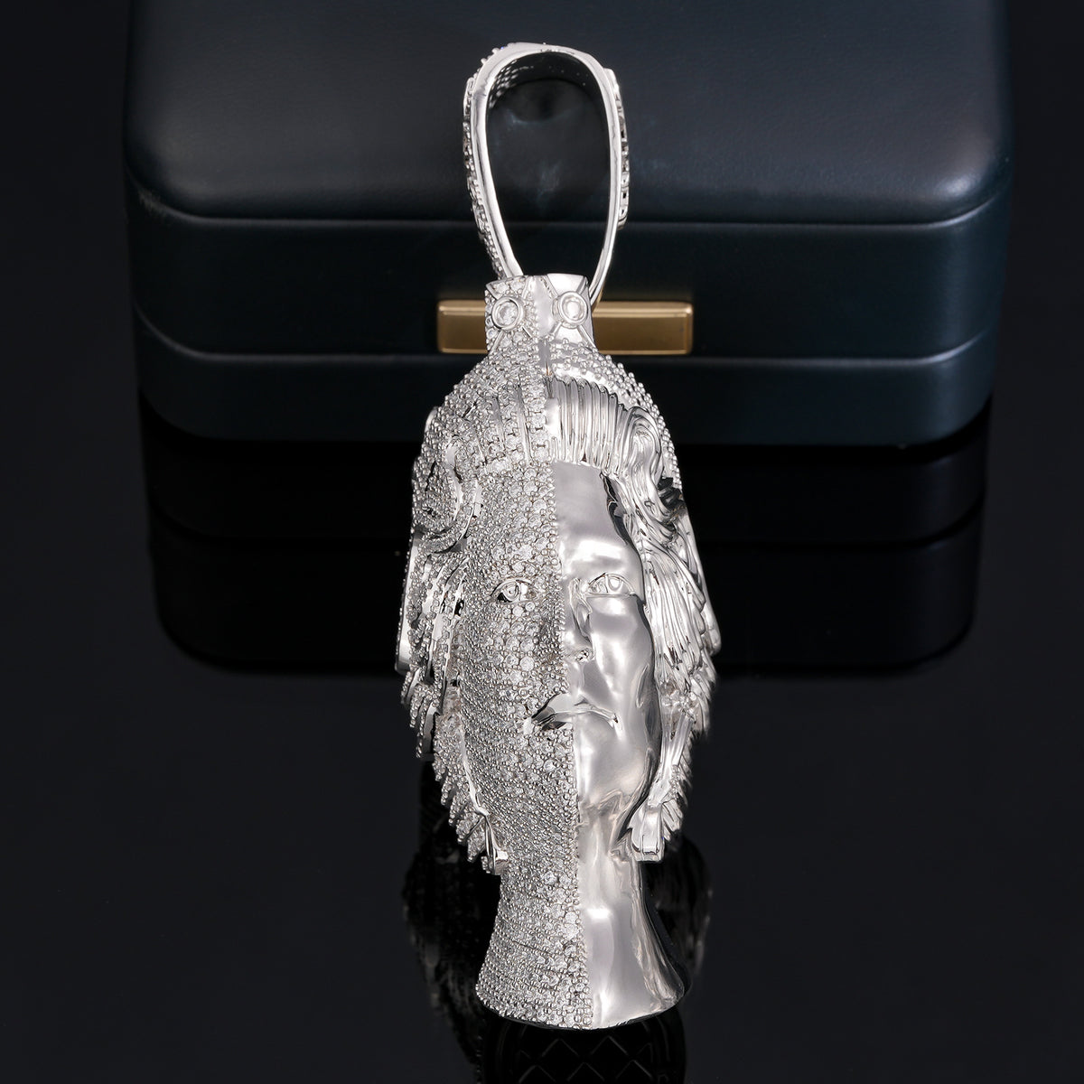 Edge view of the silver-tone queen portrait pendant showing its contrasting sculpted sides