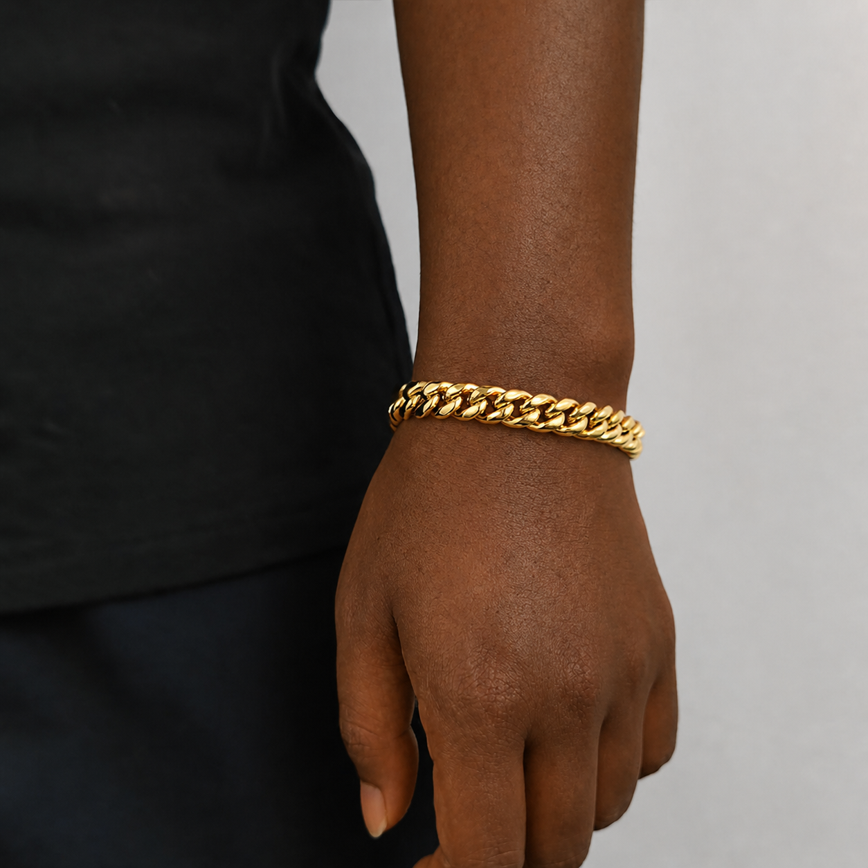 10mm gold Miami Cuban link bracelet on natural deep brown skin