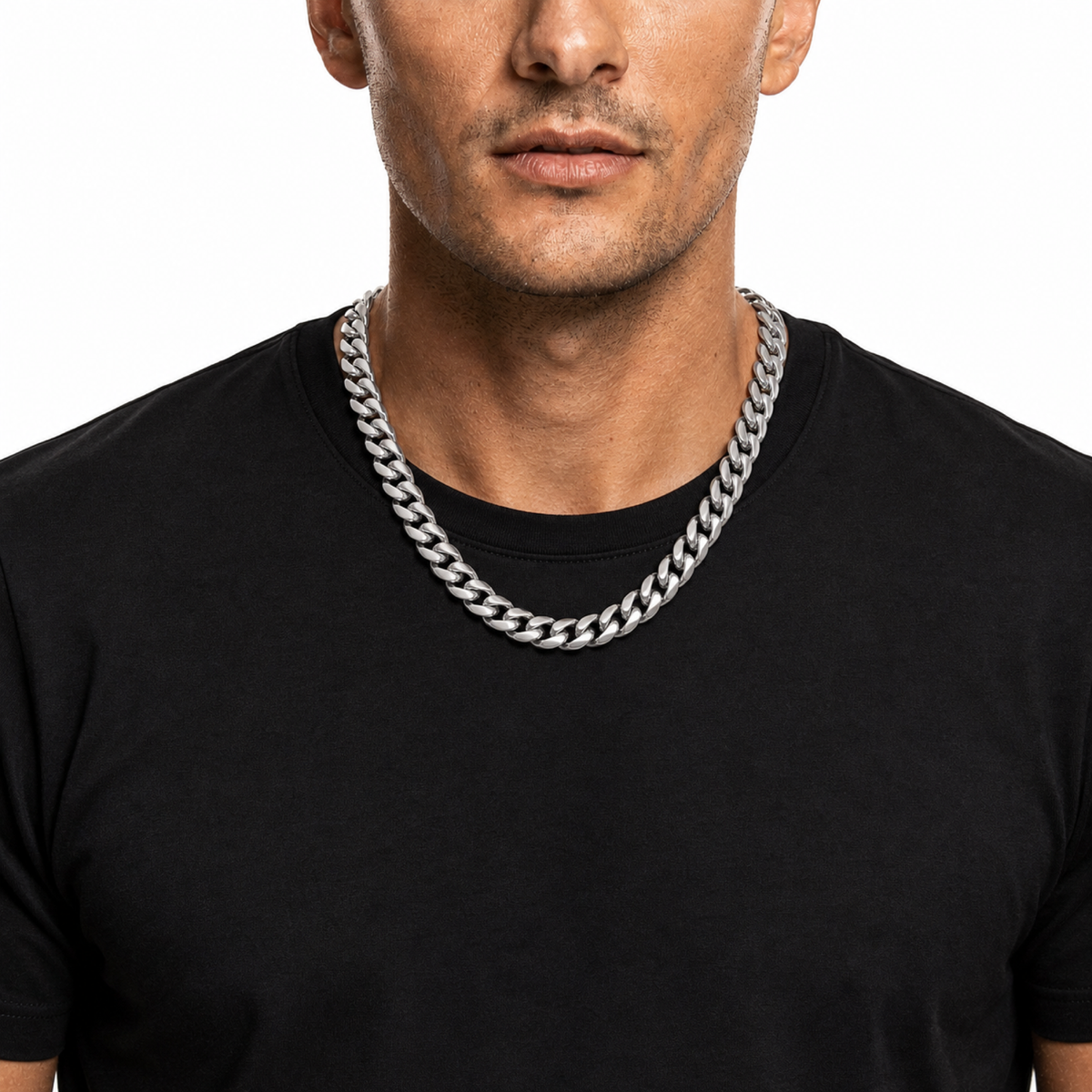 Male model wearing a 10mm stainless steel Miami Cuban chain in silver tone