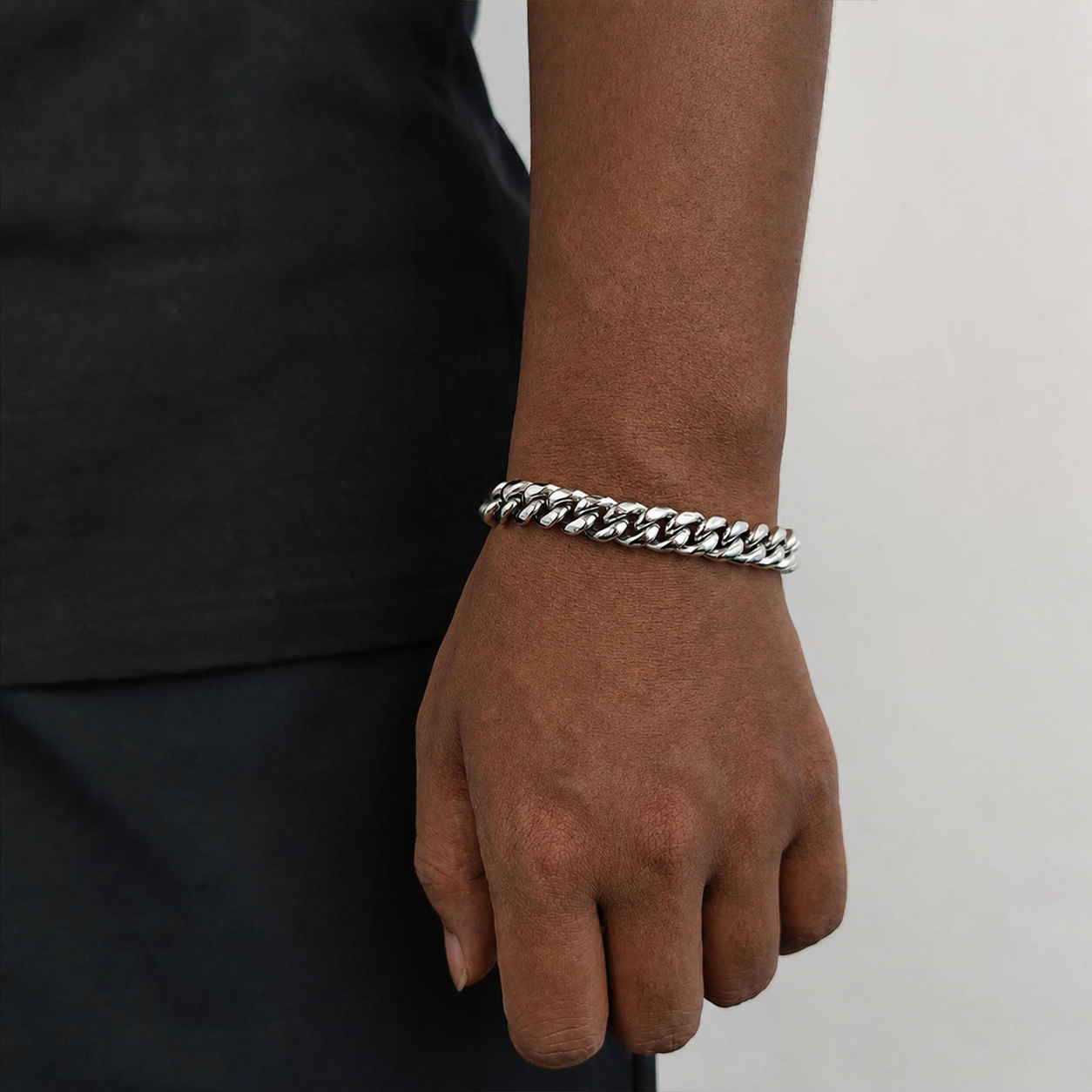 10mm steel Miami Cuban link bracelet on natural deep brown skin