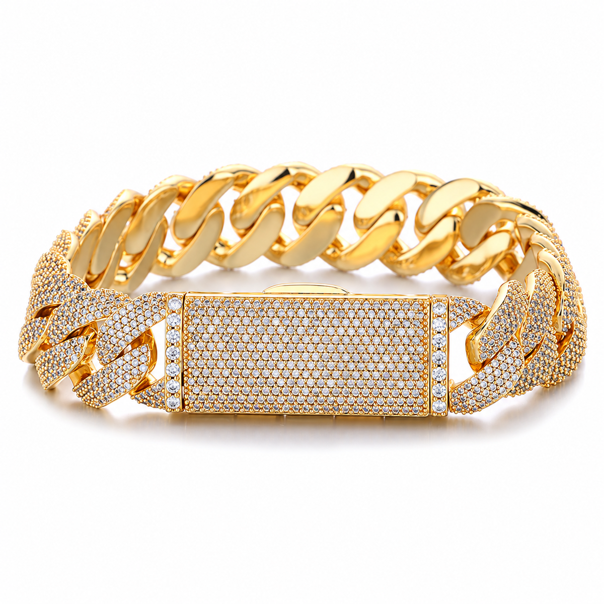 Gold-tone pavé Cuban bracelet on white showing its box clasp and smooth inner links