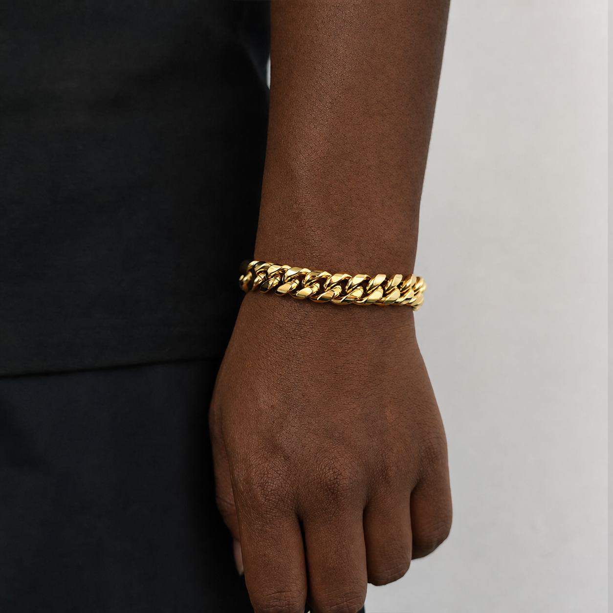 12mm gold Miami Cuban link bracelet on natural deep brown skin