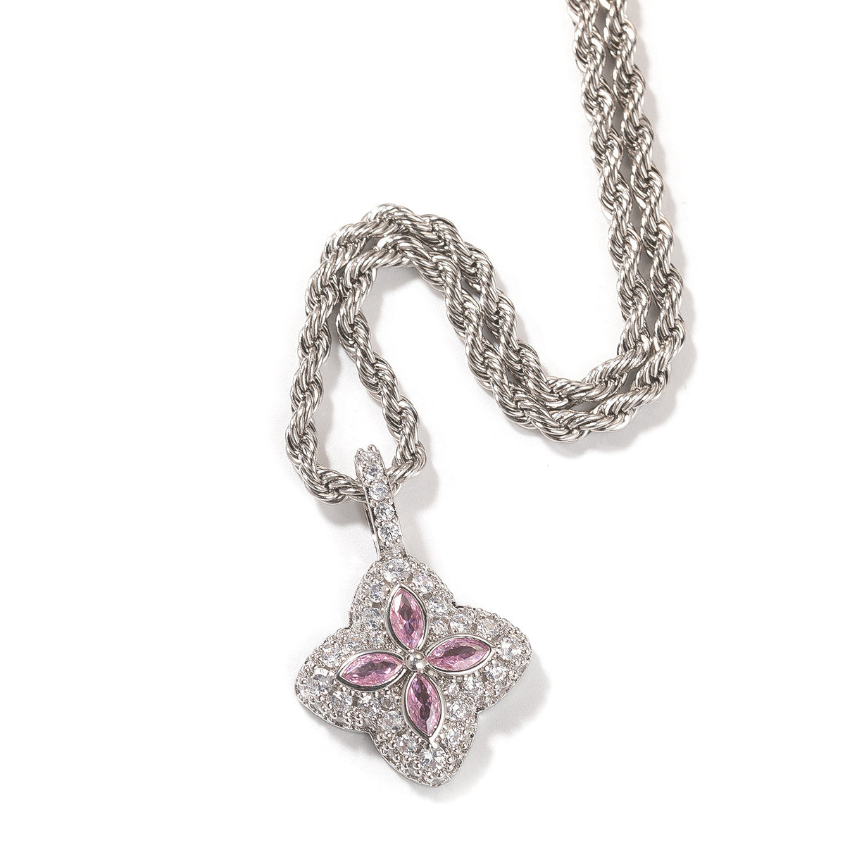Pink four-leaf clover pendant in a silver-tone setting on white