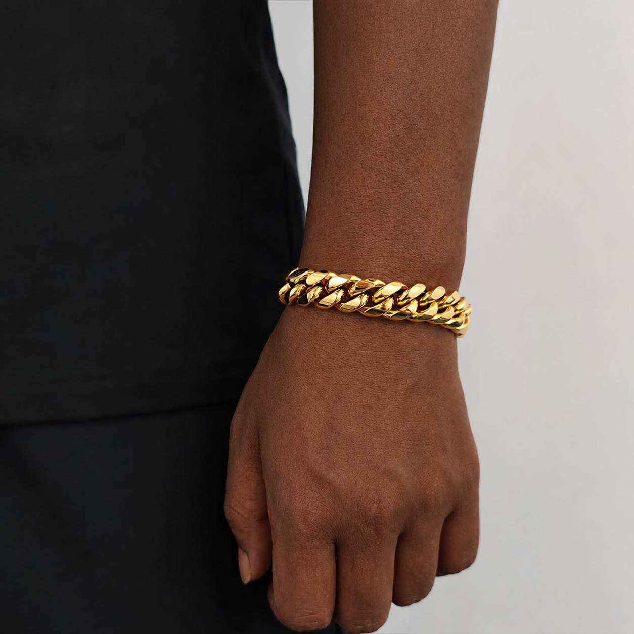 14mm gold Miami Cuban link bracelet on natural deep brown skin