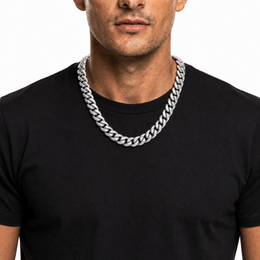 Male model wearing a 14mm stainless steel Miami Cuban chain in silver tone