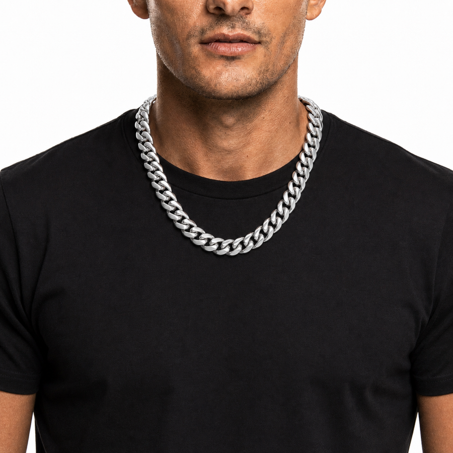 Male model wearing a 14mm stainless steel Miami Cuban chain in silver tone