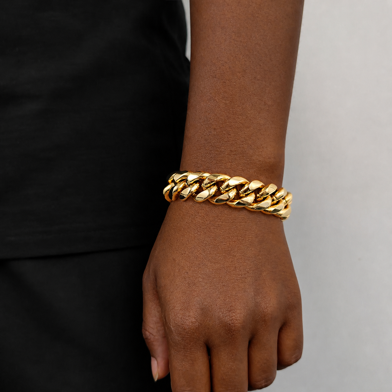18mm gold Miami Cuban link bracelet on natural deep brown skin